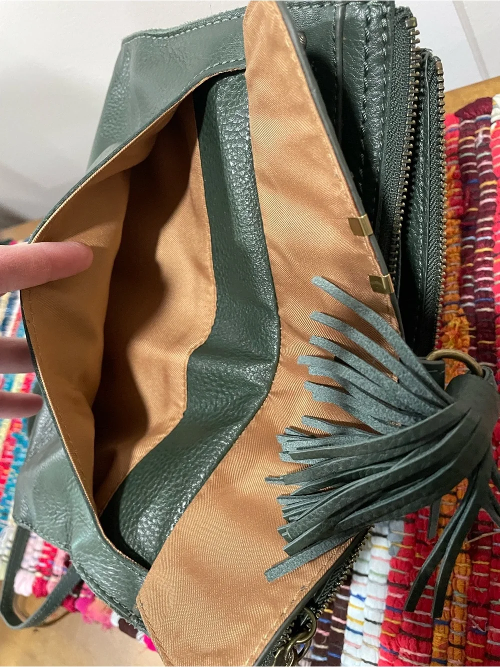 The Sak Dark Olive Green Leather Tassel Wristlet Clutch